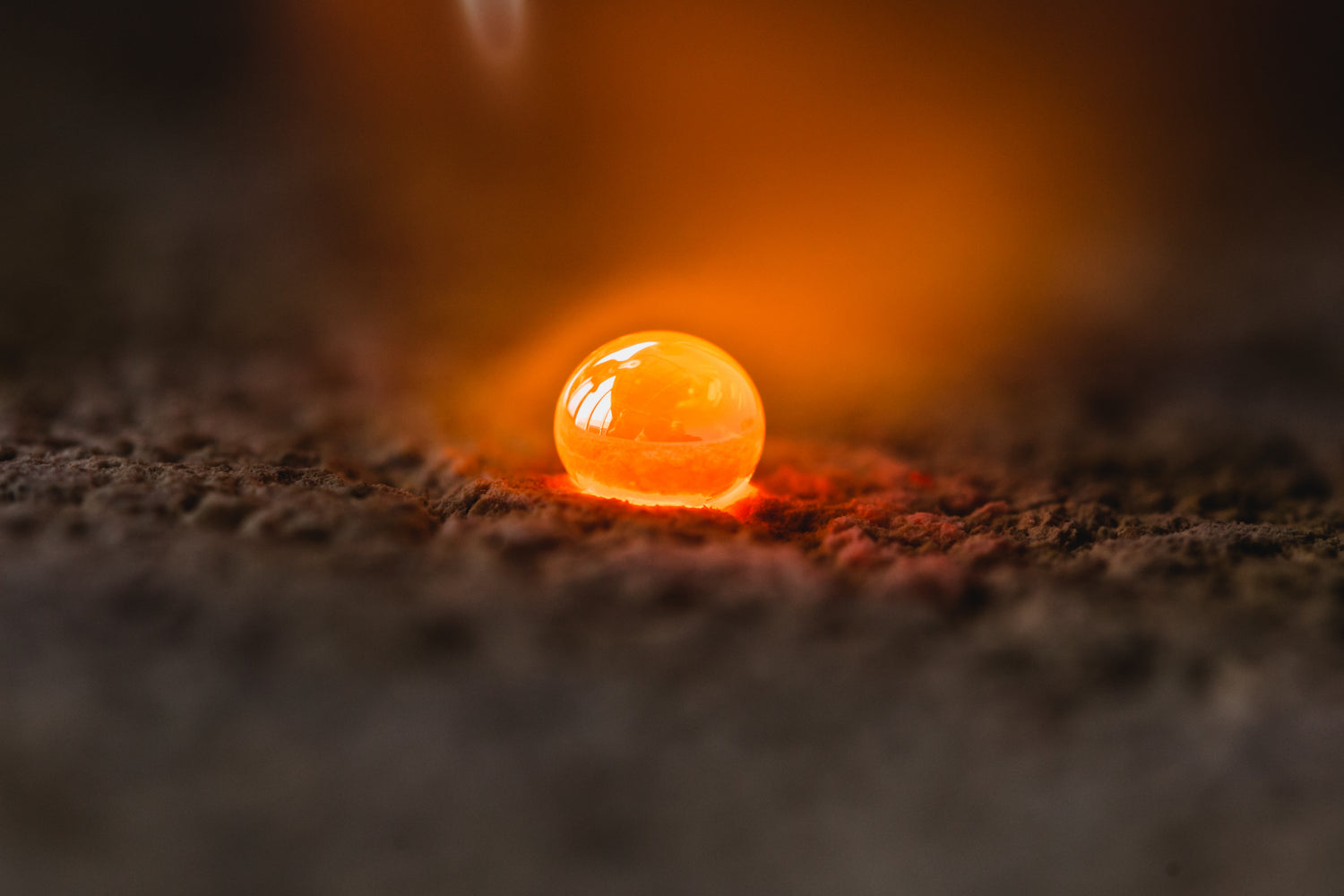A ball of liquid metal glowing orange